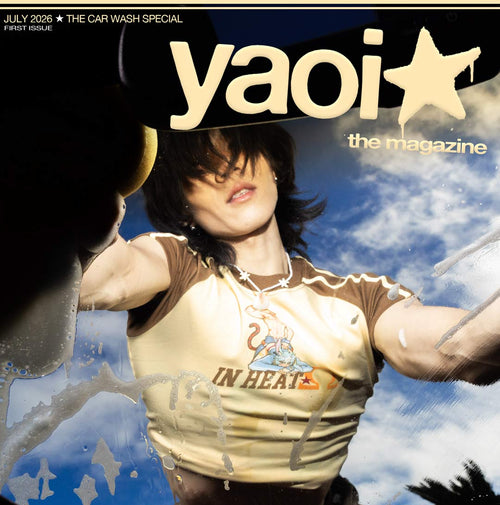 Cover of 'yaoi' magazine with a person in a car wash, featuring the title and issue details.